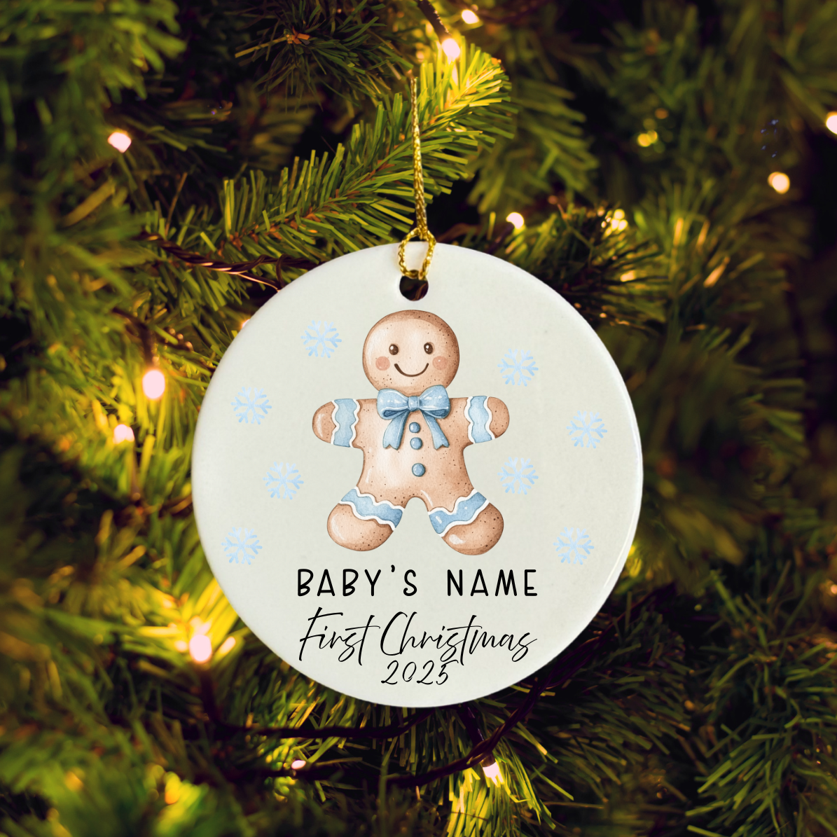 Round Christmas ornament with gingerbread baby design on a tree