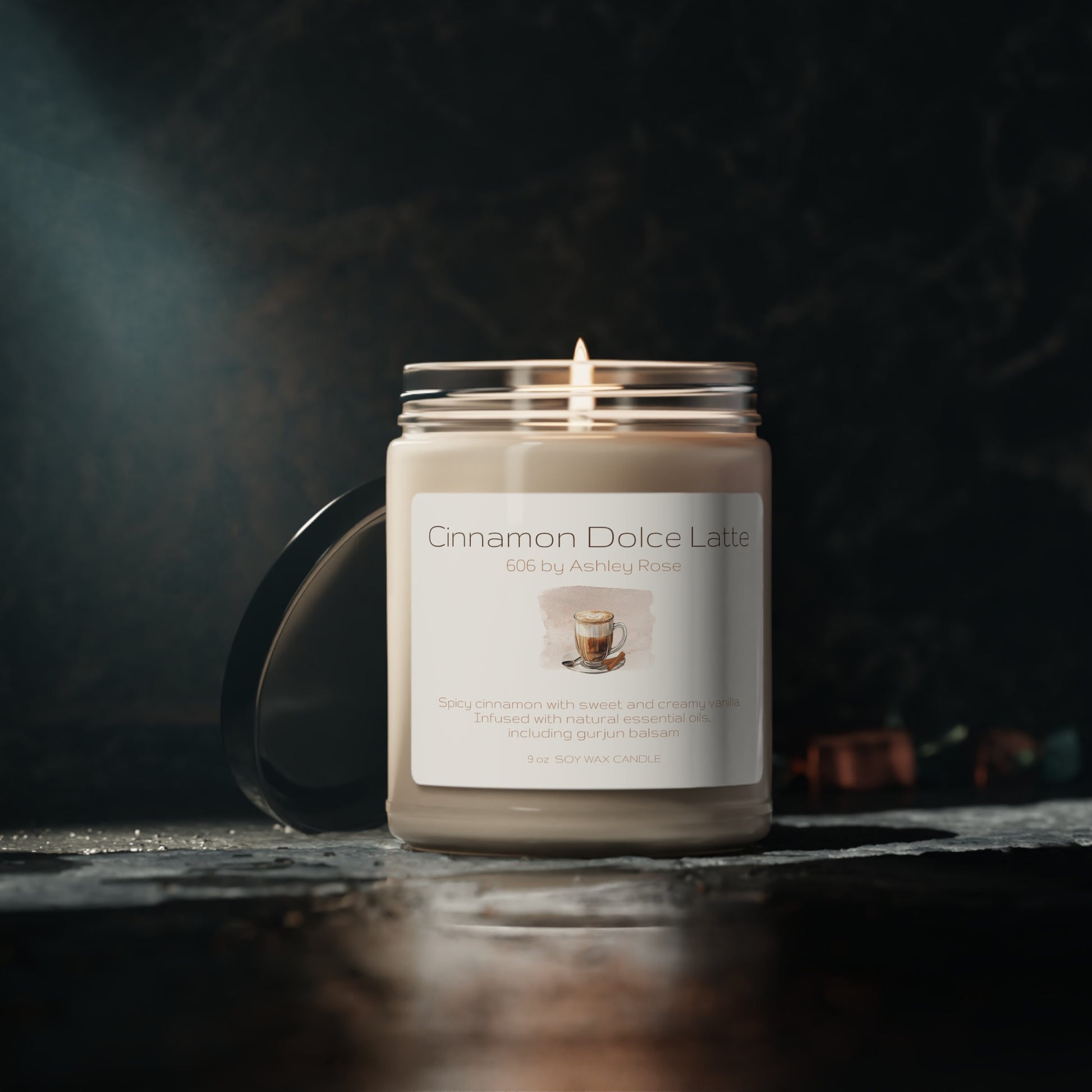 Cinnamon Dolce Latte Scented Soy Candle, 9oz, open lid, lit candle context photo