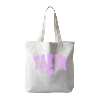 “Taken” Canvas Tote Bag – Playful Statement Carryall | Colorful Graphic Options, meaningful handmade piece by 606