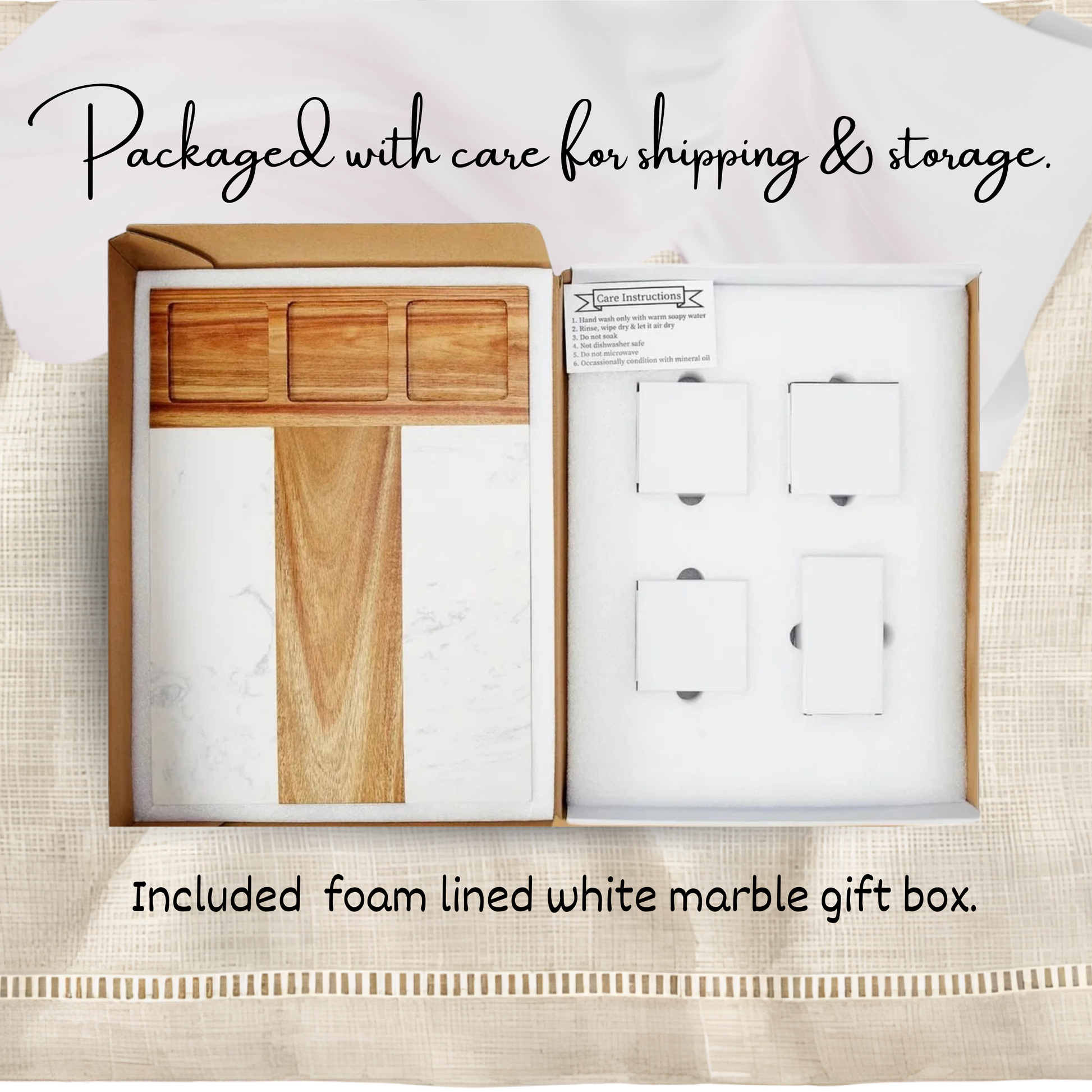 An open gift box showing a white marble & wood charcuterie board set in a foam insert on one side and four white boxes inside a foam insert on the other, with text reading 'Packaged with care for shipping & storage' and 'Included foam lined white marble gift box.'.