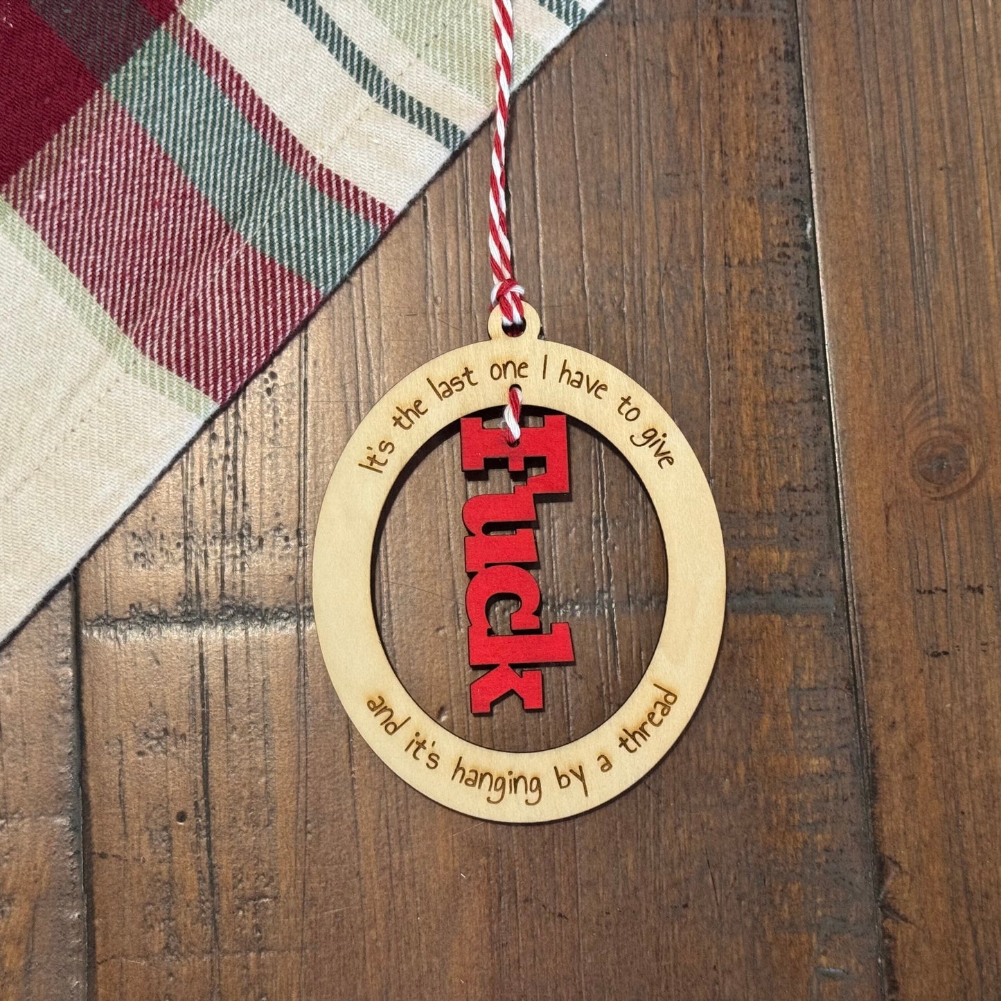 Hanging By A Thread Ornament