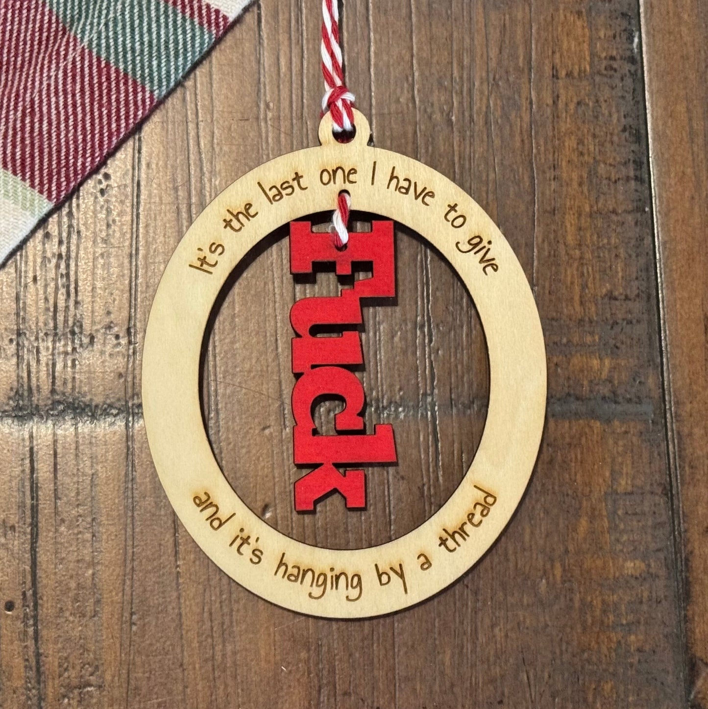 Hanging By A Thread Ornament