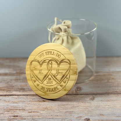 Glass Jar with engraved wood lid, activity tokens inside.